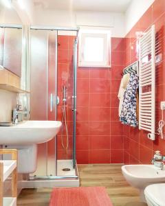 a bathroom with a shower and a sink at Polignano Vista Mare in Polignano a Mare +58 photos