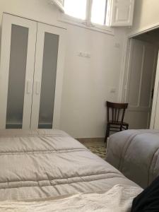 Gulta vai gultas numurā naktsmītnē Trapani Apartments