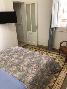 Gulta vai gultas numurā naktsmītnē Trapani Apartments