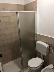 Vannas istaba naktsmītnē Trapani Apartments
