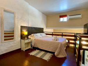 a bedroom with a bed and a window at Loft en Villa Crespo in Buenos Aires