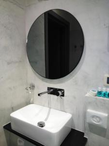 Koupelna v ubytování Hotel Cala Di Forno