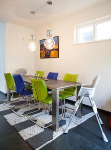 a dining room with a table and chairs at Skipper 4 - 3 bedroom authentic detached house in City Center in Groningen