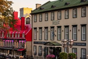 a group of buildings on a city street at Hotel Manoir Morgan in Quebec City