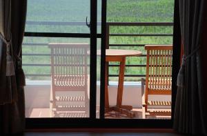 En balkong eller terrasse på Ibali Hostel
