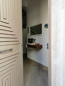 A kitchen or kitchenette at Le Sette Meraviglie