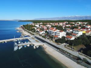 an aerial view of a small town next to the water at Villa Vukic in Vrsi