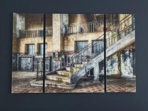 a painting of a staircase in front of a building at Belle Epoque in Vienna