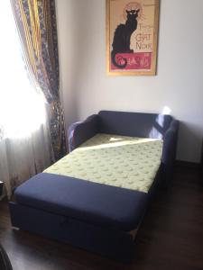 Ένα ή περισσότερα κρεβάτια σε δωμάτιο στο Apartment on Ovodova