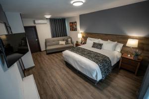 Postel nebo postele na pokoji v ubytování Hotel Corral Grande