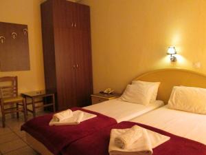 Postel nebo postele na pokoji v ubytování Hotel Lito