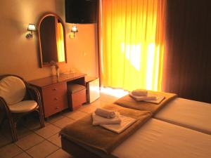Postel nebo postele na pokoji v ubytování Hotel Lito