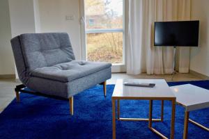 Posezení v ubytování Haus unter den drei Bäumen - Urlaub auf der Sonneninsel Usedom