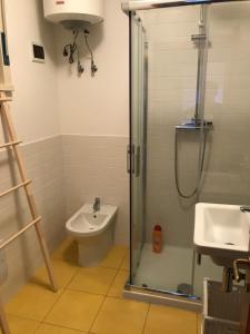 Ванная комната в La Lampara Apartment