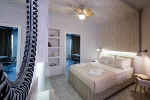 Postel nebo postele na pokoji v ubytování NK Apartments