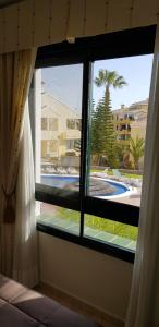 Basen w obiekcie Apartment Campoamor Descansa lub w pobliżu