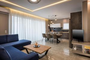 TV a/nebo společenská místnost v ubytování Mirma Luxury Apartment