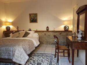 Кровать или кровати в номере Jardin de Mathilde