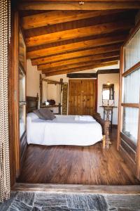 Postel nebo postele na pokoji v ubytování Casa Rural Therma Agreste