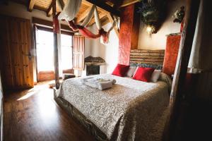 Postel nebo postele na pokoji v ubytování Casa Rural Therma Agreste