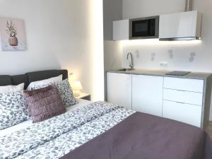Kuchyňa alebo kuchynka v ubytovaní Exclusive Apartments Smolna