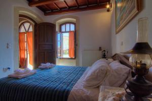 A bed or beds in a room at Grand Palazzo