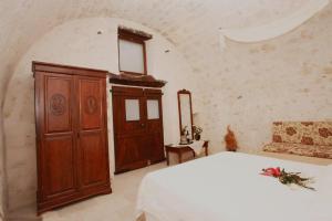 A bed or beds in a room at Grand Palazzo