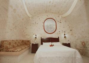 A bed or beds in a room at Grand Palazzo