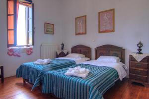 A bed or beds in a room at Grand Palazzo