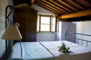 Cama o camas de una habitación en La Casetta di Cate