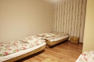 Posteľ alebo postele v izbe v ubytovaní Pod Modrzewiem