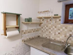 Kuchyň nebo kuchyňský kout v ubytování Apartmány Sharka -Šárka Justrová