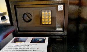 a model of a microwave oven sitting on a table at Casa Picasso Near Chabad House in Bangkok