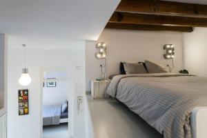 Posteľ alebo postele v izbe v ubytovaní White Loft Alicante