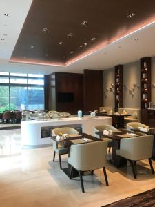 Χώρος καθιστικού στο LJZ Supreme Tower Hotel