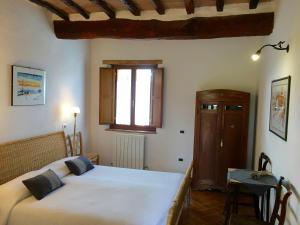 Een bed of bedden in een kamer bij Casa Cernano