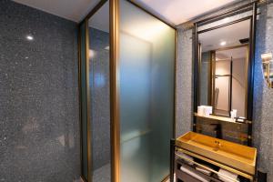 Koupelna v ubytování Hangzhou Cosy Park Hotel(Liangzhu) + 28 fotografií