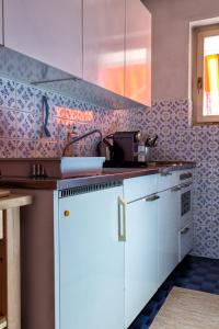 A kitchen or kitchenette at Minusio - Casa Gottardo