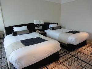 Letto o letti in una camera di Hotel Granvia Hiroshima