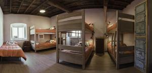 A bed or beds in a room at La Figal de Xugabolos, Salas