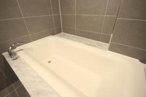 Koupelna v ubytování SOYU Hotel