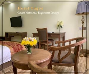 TV a/nebo společenská místnost v ubytování Hotel Tugos