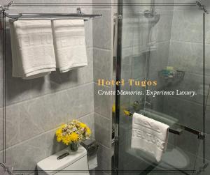 Koupelna v ubytování Hotel Tugos