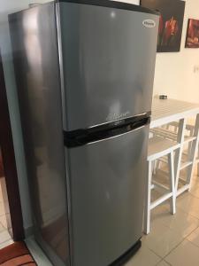 A kitchen or kitchenette at Pool View One bedroom Apt - B103