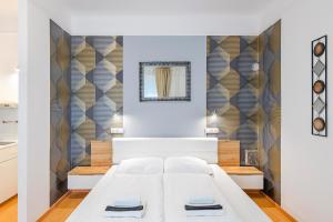 Posteľ alebo postele v izbe v ubytovaní PARKING, AC, WIFI 2 room apartment in the center