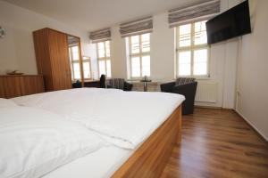 Łóżko lub łóżka w pokoju w obiekcie Ferienwohnung Ballstrasse 28