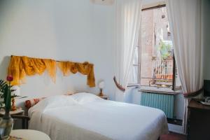 A bed or beds in a room at B&B La Romea