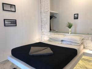 Postel nebo postele na pokoji v ubytování Satta Beach Deluxe