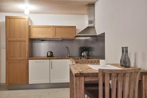 Kuchyňa alebo kuchynka v ubytovaní Residence Sněžka