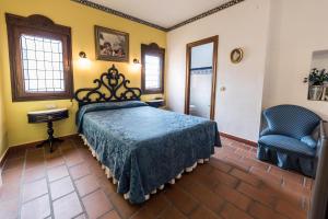 Posteľ alebo postele v izbe v ubytovaní Hotel Soho Boutique Palacio San Gabriel